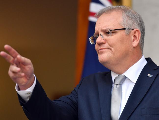 Prime Minister Scott Morrison talks to the media at a press conference at Parliament House in Canberra, Wednesday, March 25, 2020. (AAP Image/Mick Tsikas) NO ARCHIVING