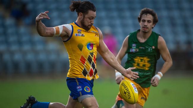 NTFL qualifying final: St Mary's v Wanderers at TIO Stadium. Brenton Motlop about to put boot to ball (L). Photograph: Che Chorley