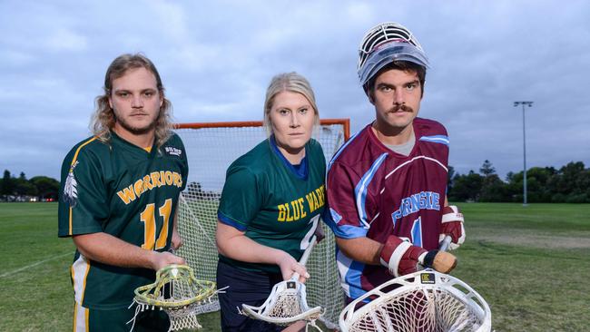 Jayden Pena from Woodville, Charlotte Whinnen from Woodville Blue Warriors and Jack Jercic from Burnside are all playing in round one double-header in the Lacrosse SA State League, Wednesday, April 21, 2021. Picture: Brenton Edwards