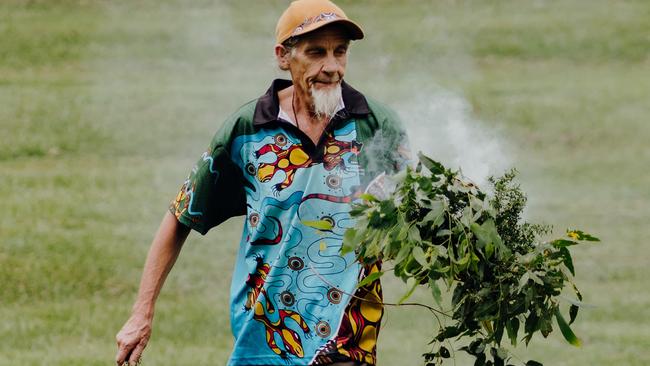 Andrew Johnston performs a smoking ceremony at Kyogle’s Australia Day activities.