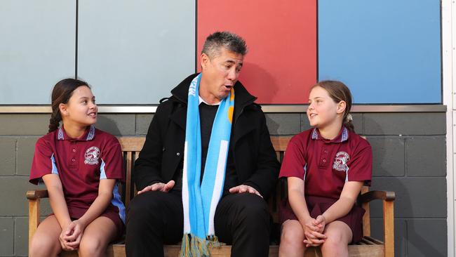 Burleigh Heads State School Principal Peter Tong at work talking to year six students Kaiya Massey 11 (left) and Chanelle Clack 11. . Picture Glenn Hampson