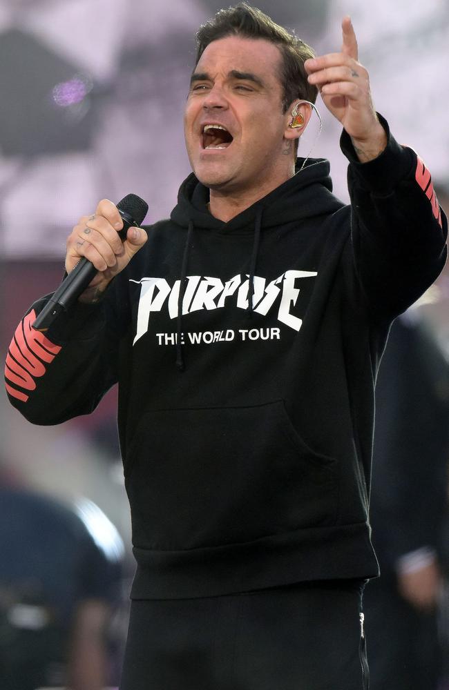 British musician Robbie Williams performs at the One Love Manchester benefit concert for the families of the victims of the May 22, Manchester terror attack, at Emirates Old Trafford in Greater Manchester on June 4, 2017. Picture: Dave Hogan for One Love Manchester