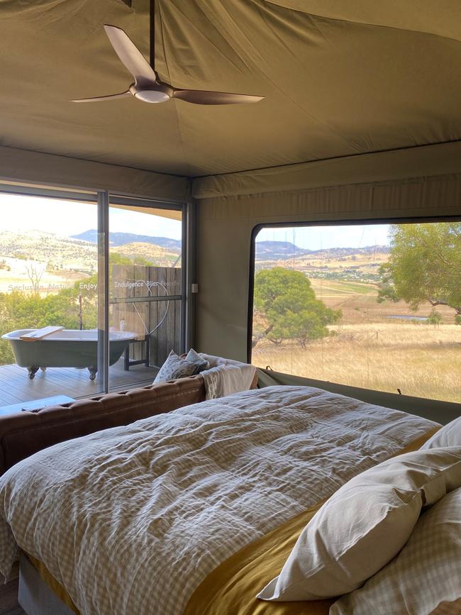 The kingsize bed with a view at Aquila Glamping. Picture: Supplied.