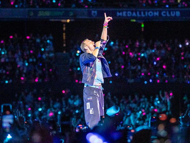 Marvel Stadium lights up for Coldplay. Picture: Jake Nowakowski