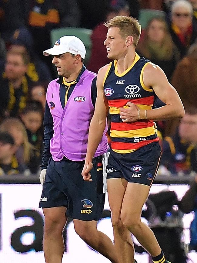 David Mackay grabs his ribs after a big hit on Saturday. Picture: Daniel Kalisz/Getty Images