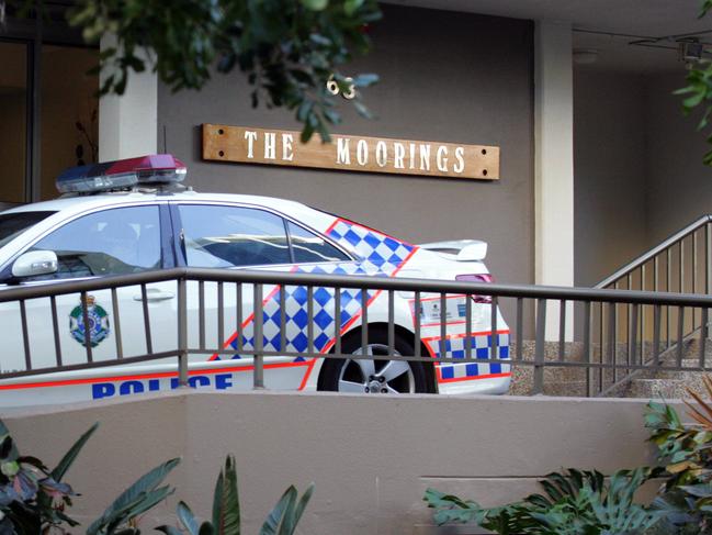 Police officers investigate the death of a woman who fell from a balcony on The Moorings apartment building in Cavill Avenue, Surfers Paradise.