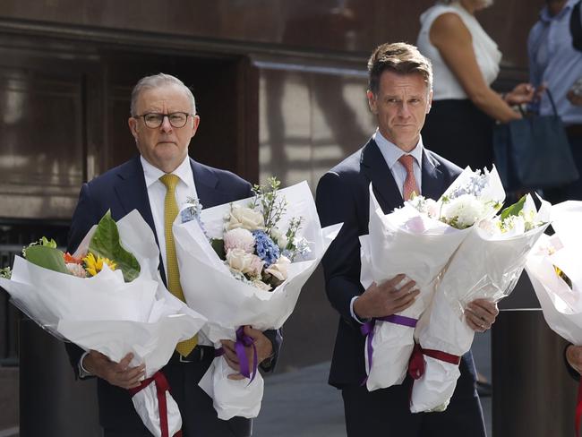 DAILY TELEGRAPH 16TH DECEMBER 2024Pictured at Martin Place in Sydney is Prime Minister Anthony Albanese and NSW Premier Chris Minns as they lay flowers on the 10th anniversary of the Lindt Cafe siege.Picture: Richard Dobson