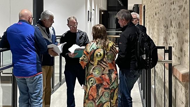 Cosie Costa of Gawler South FC and Geoff Baynes discuss the situation outside of the Gawler Council meeting. Picture Jason Katsaras