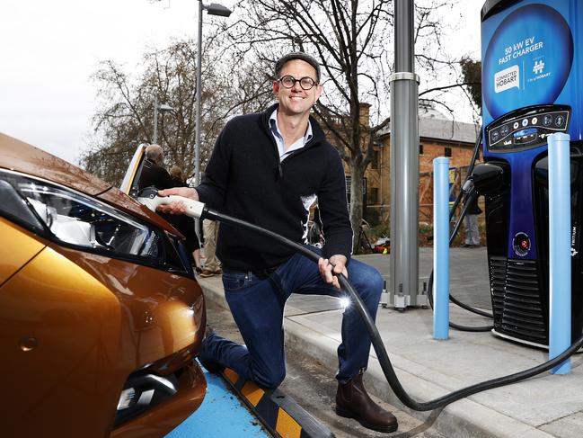 Director of The Good Car Company Anton Vikstrom uses an electric vehicle charging station in the city. Picture: Zak Simmonds