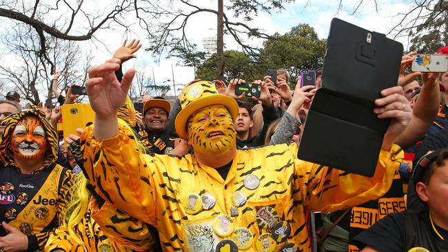 Tigers fans show their support during the 2017 AFL Grand Final Parade today in Melbourne. Picture:  SCOTT BARBOUR/GETTY IMAGES