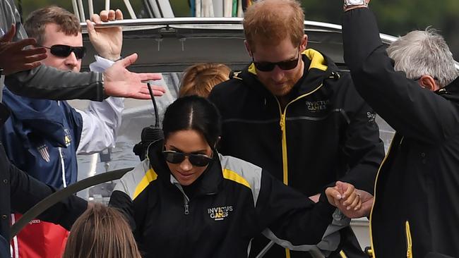 The couple later watched the sailing events. Picture: Saeed Khan/AFP