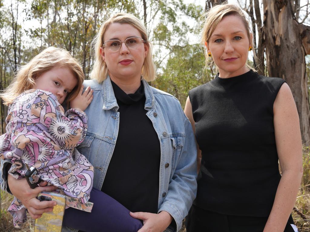 Discussing the state government's proposed North-South transport corridor through the Toowoomba region are Highfields resident and activist Amy Clark (left, with daughter Bonnie) and Queensland Greens Senator Larissa Waters.