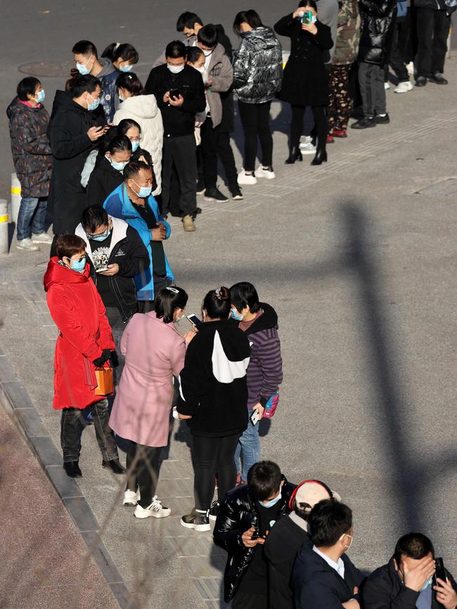 People line up to be tested for coronavirus in Xi'an ahead of a busy travel season. Picture: AFP