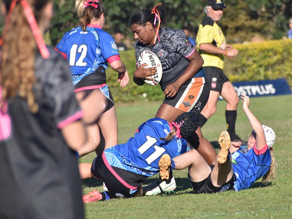 Rockhampton Tigers' prop Vivian Mosby charges into the Norths' defensive line in the Rocky Junior League under-17 girls grand final. Photo: Pam McKay