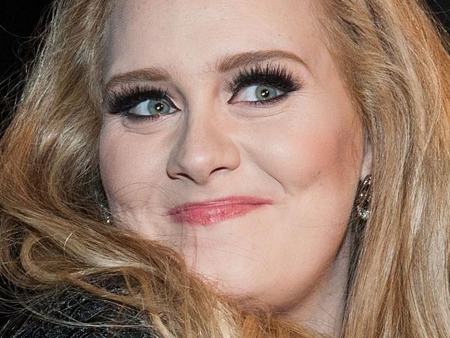 (FILES) In this February 24, 2013 file photo, Adele arrives at the 2013 Oscars Governors Ball on February 24, 2013 in Hollywood, California. Adele on November 2, 2015 shattered a record with her long-awaited song "Hello," which became the first track downloaded more than one million times in a week in the United States. "Hello," a piano ballad that is the debut single from the British pop star's first album in nearly five years, opened at number one for the week through Thursday on the Billboard Hot 100 singles chart, which monitors sales, streaming and radio play. AFP PHOTO/VALERIE MACON arrives at the Premiere of CBS Films' Salmon Fishing in the Yemen, in Los Angeles, California, on March 5, 2012. AFP PHOTO/VALERIE MACON arrives at the Premiere of CBS Films' Salmon Fishing in the Yemen, in Los Angeles, California, on March 5, 2012. AFP PHOTO/VALERIE MACON arrives at the Premiere of CBS Films' Salmon Fishing in the Yemen, in Los Angeles, California, on March 5, 2012. AFP PHOTO/VALERIE MACON