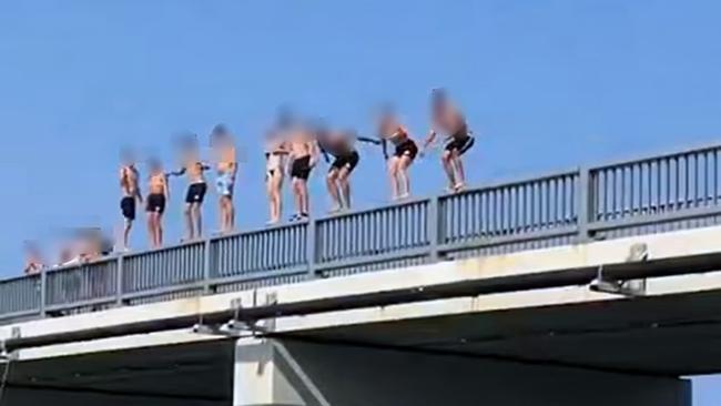 The Noosa Sound Bridge is popular for tourists to jump off into the water below.