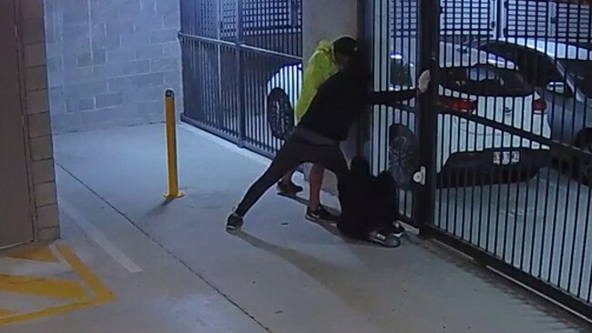 Three thieves work desperately to open security door. Pic: Supplied