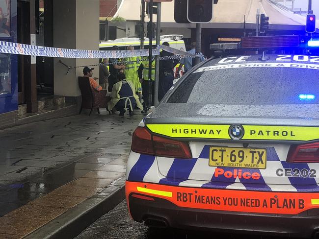 In harrowing scenes, a dozen bystanders and local shop keepers attempted to give CPR to a young woman at the busy Leichhardt Market Place shopping centre intersection. Picture: Charles Miranda