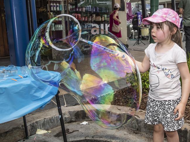 See photos: Hustle and bustle returns to historical CBD street