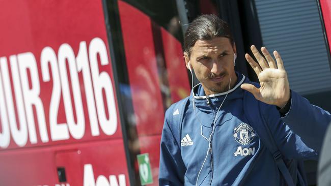 Manchester United's new striker Zlatan Ibrahimovic exits the team coach.