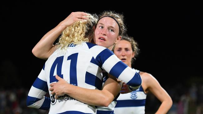 Geelong’s Mikayla Bowen embraces teammate Georgie Prespakis after losing their preliminary final in November last year in Ipswich. Picture: Albert Perez/Getty Images.