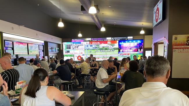 Punters placing their bets at the Ettamogah Pub.