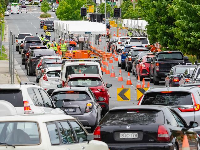 ALBURY NSW, AUSTRALIA - The Australian.  Oct 26th, 2020:Police at the Albury Border Check point in Wodonga Place Albury checking people travel from Victoria into NSW for border passes.Picture: Simon Dallinger