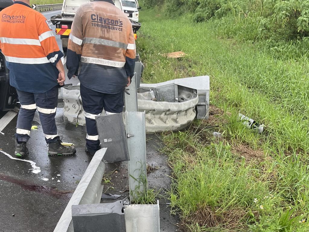 The Bruce Highway has been shut after a single vehicle crash injured and trapped one man. Photo: Luke Lay