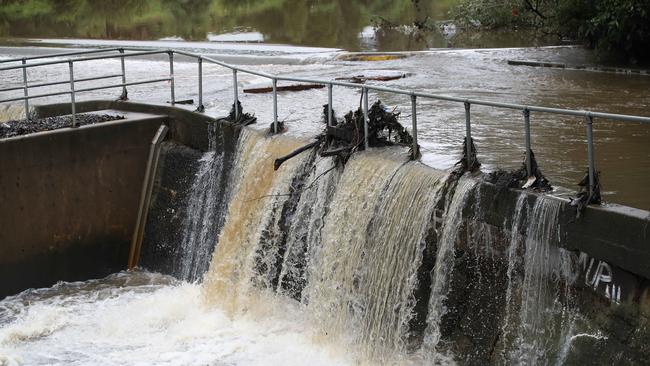 Parramatta Weir was overflowing. Picture: David Swift