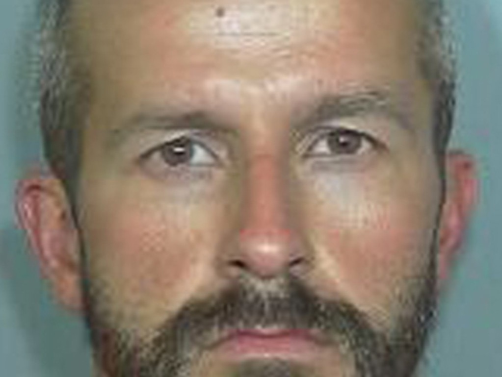 Chris Watts keeps pictures of the wife and daughters he killed in his prison cell, and says he reads to his dead daughters every night from a children’s book. Picture: AP