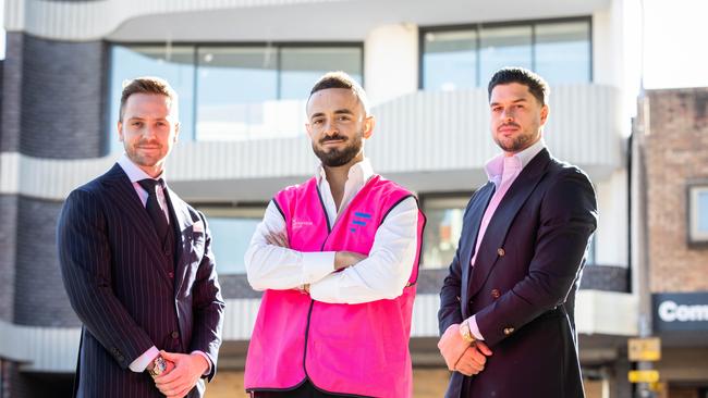 Luxury homes real estate agent Gavin Rubinstein outside his new Rose Bay office. Pictured Left is Oliver Lavers and right is Cae Thomas. Picture – Chris Pavlich for The Australian