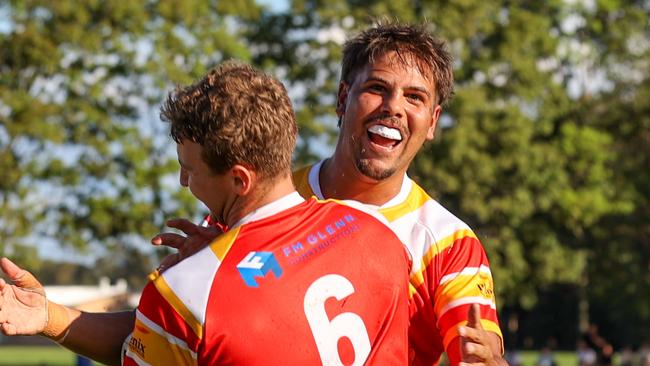 Ronan Singleton (right) and Jett McCarthy (left) celebrate a try. Coffs Harbour Comets v Macksville Sea Eagles, Group 2 Rugby League round one, 2025, at Geoff King Motors Oval. Picture: D Wigley