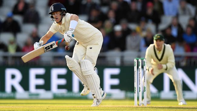 Joe Denly cops one on the body from Mitchell Starc. Picture: Getty Images