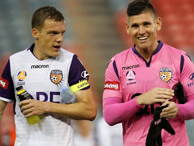 Glory players Shane Lowry, Liam Reddy and Ivan Franjic all smiles after during the Round 8 A-League match between the Newcastle Jets and the Perth Glory at the McDonald Jones Stadium in Newcastle, Sunday, December 16, 2018. (AAP Image/Darren Pateman) NO ARCHIVING, EDITORIAL USE ONLY