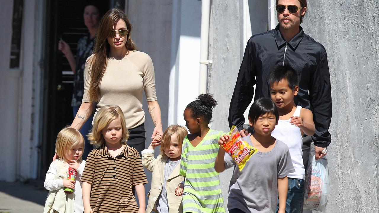 Brad Pitt, Angelina Jolie and their six children. Picture: Splash.