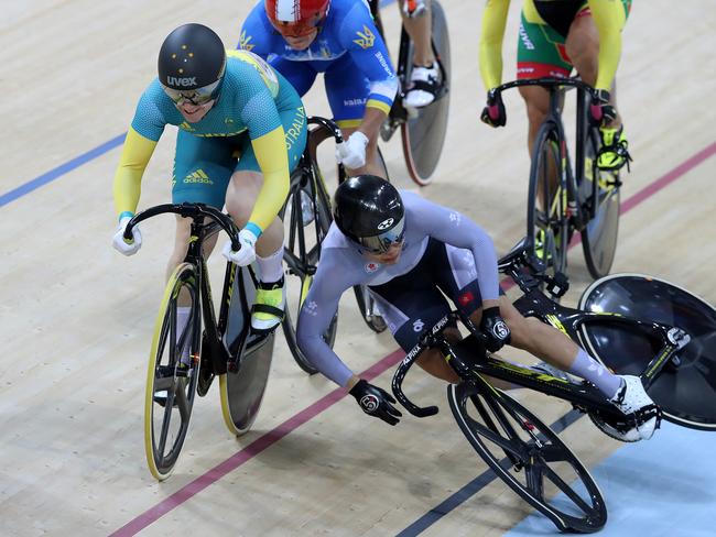 Wai Sze Lee falls next to Anna Meares in a rough keirin semi-final.