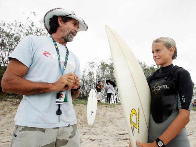 Palm Beach-Currumbin High School surfing programme. (L-R) Surfing Queensland Surf Coach Phil McNamara and student Mitch Ellis in the 2010s