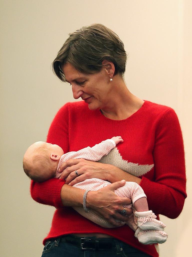 Greens leader Cassy O’Connor has a hold of Lara Giddings’ new baby Natasha at the declaration of the polls. Picture: SAM ROSEWARNE