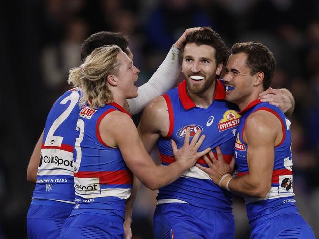 MELBOURNE, AUSTRALIA - AUGUST 02:  Marcus Bontempelli of the Bulldogs celebrates a goal during the round 21 AFL match between Footscray Football Club and Melbourne Demons at Marvel Stadium, on August 02, 2024, in Melbourne, Australia. (Photo by Darrian Traynor/Getty Images)