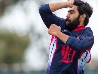 Dandenong's Akshat Buch sends one down. Picture: Cricket Victoria