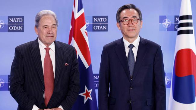 Winston Peters (L) and South Korean Foreign Minister Cho Tae-yu during a meeting of the North Atlantic Council with Indo-Pacific partners. Picture: AFP.