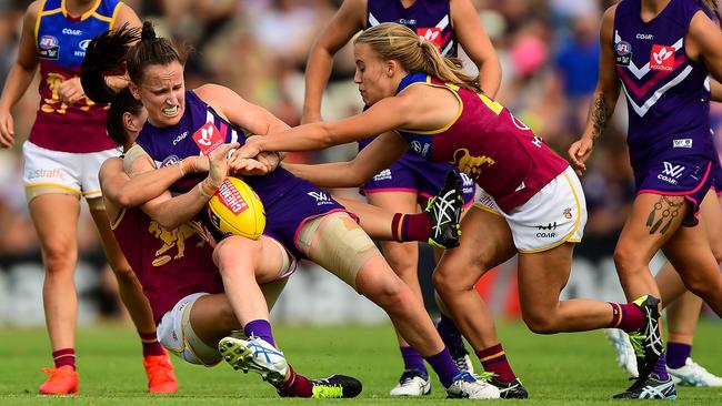 Kara Donnellan is tackled during the first season of AFLW.