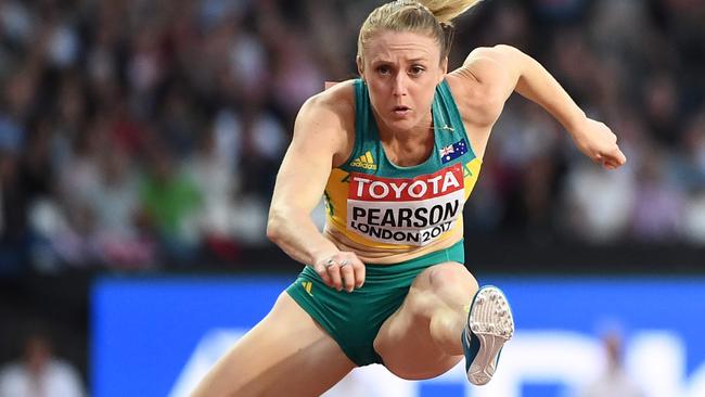 Sally Pearson on her way to a gold medal. Picture: AFP Photo
