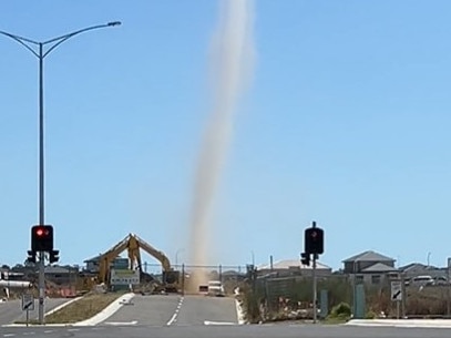 A sand twister whips sand and debris up in the air at a Clyde construction site. Picture: Reddit