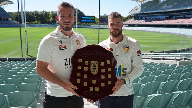 Tea Tree Gully’s Joe Gatting (left) with West Torrens captain Daniel Drew. Picture: SACA