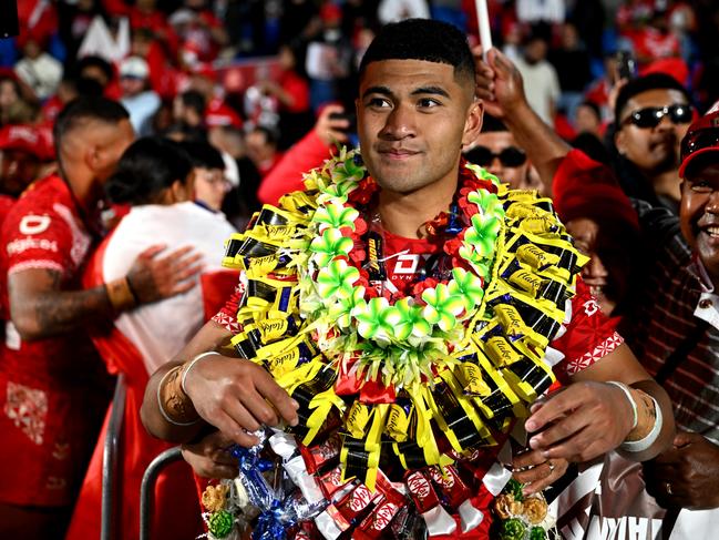 AUCKLAND, NEW ZEALAND - NOVEMBER 02: Isaiya Katoa of Tonga celebrates with fans after winning the men's 2024 Rugby League Pacific Championship match between New Zealand Kiwis and Tonga XIII at Go Media Stadium on November 02, 2024 in Auckland, New Zealand. (Photo by Hannah Peters/Getty Images)