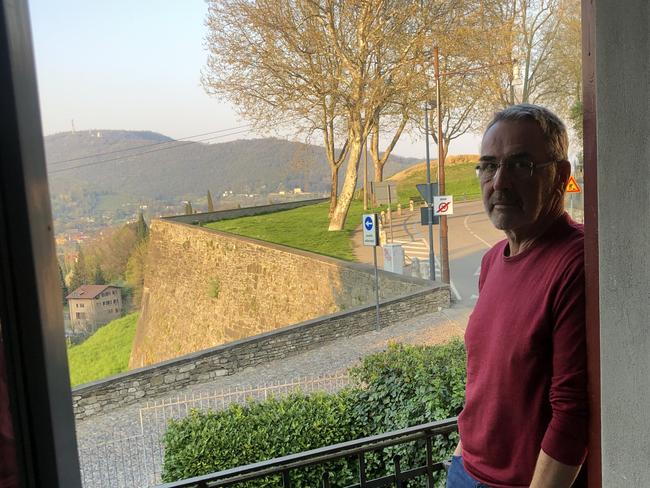 Aussie John Carey on the balcony of his small apartment. Picture: Supplied