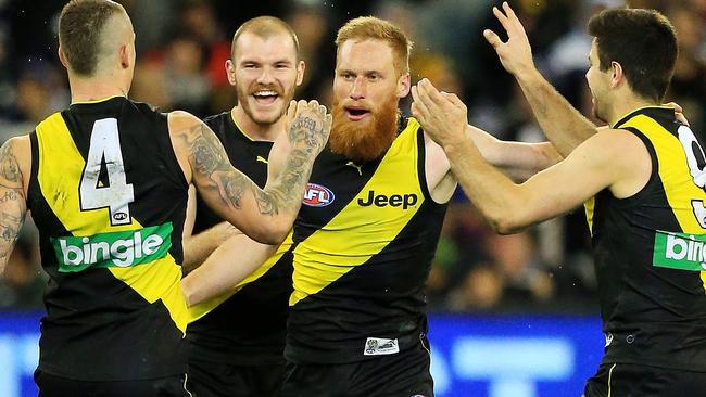 Richmond players celebrate their win against Geelong. Picture: Mark Stewart