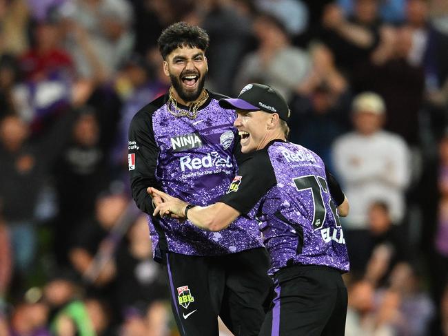 Nathan Ellis and Nikhil Chaudhary of the Hurricanes celebrate the semi final win over the Sixers. (Photo by Steve Bell/Getty Images)