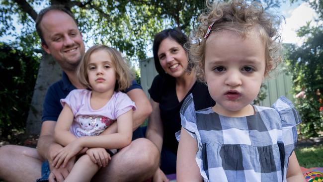 Amanda and Simon Hookins got a diagnosis for their daughter Nelle, 2, pictured with her parents and older sister Mae. Picture: Jake Nowakowski